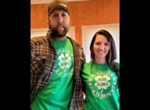 Derek Bieri with his wife Jessica wearing green shirt promoting Irish cold snack available on their store